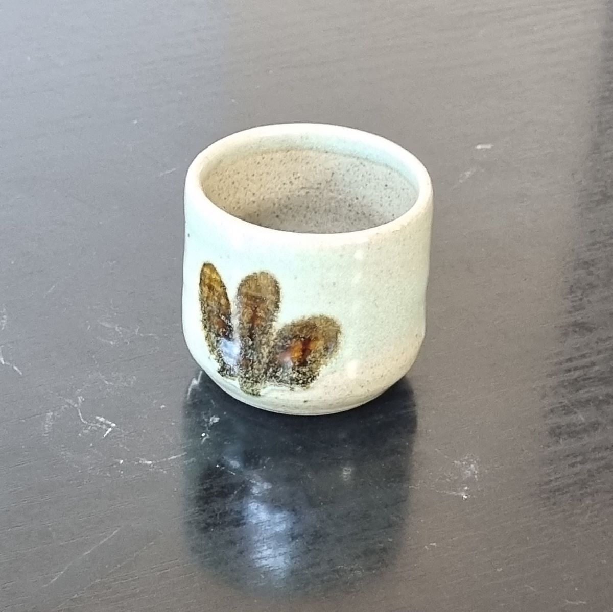 Coffee cup (no handle) in celadon green by Clifton Hill Pottery in.cube8r