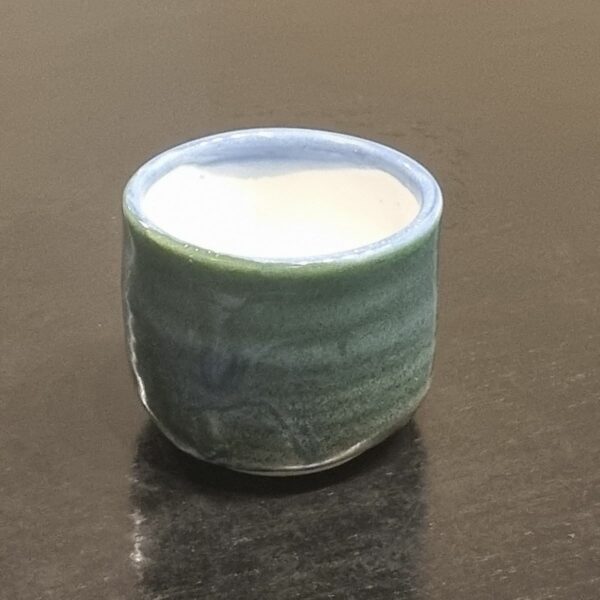 Coffee cup (no handle) in blue & green by Clifton Hill Pottery in