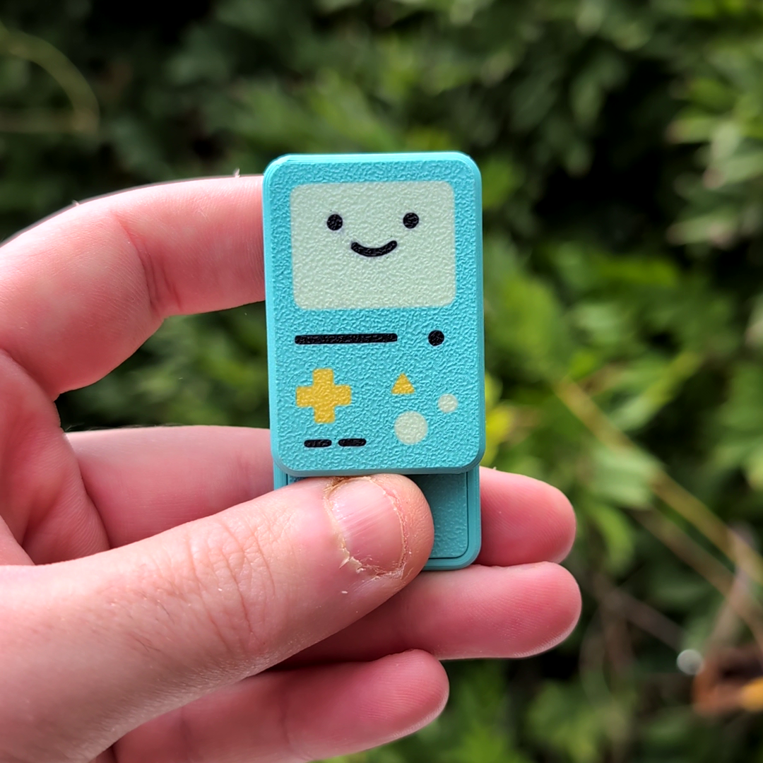 BMO Haptic Fidget slider! 3 types; smiley, winky and sleepy BMO! by wookieeprint BMO Haptic Fidget slider! 3 types; smiley, winky and sleepy BMO! by wookieeprint
