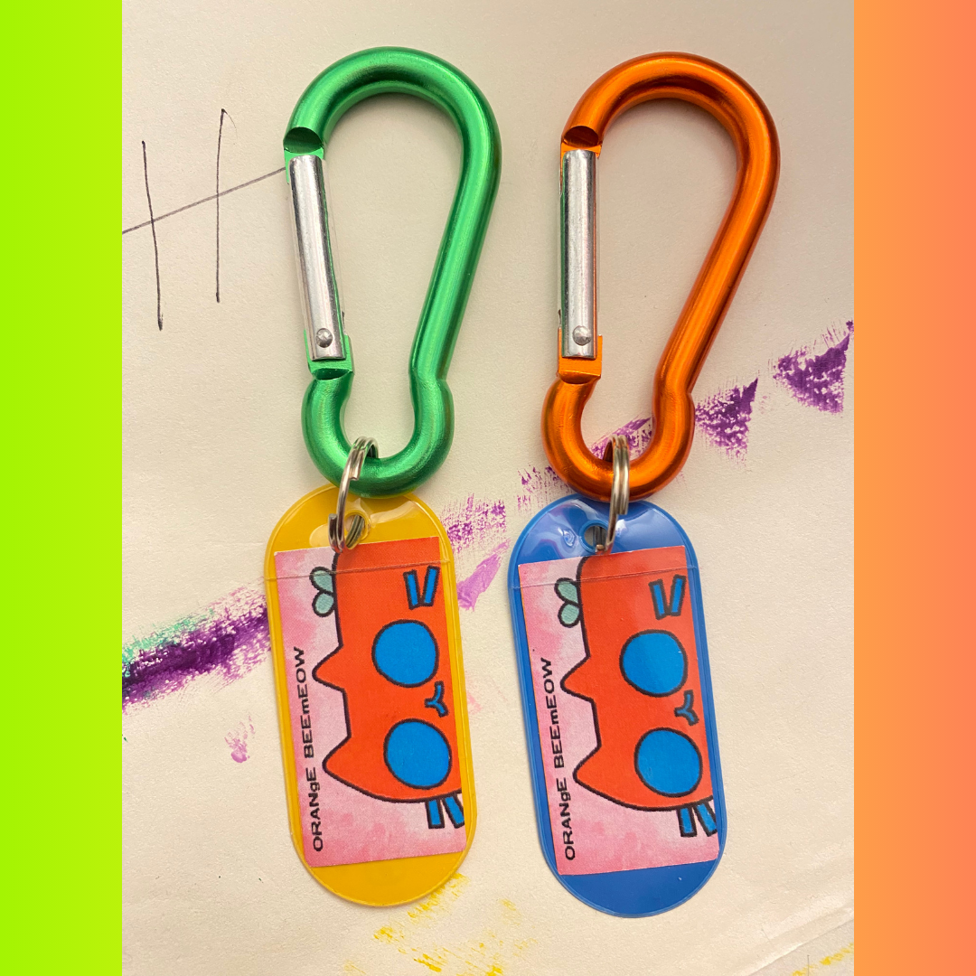 'ORANgE BEEmEOW’ V.1 Vinyl Keychain by Nathaniel 'ORANgE BEEmEOW’ V.1 Vinyl Keychain by Nathaniel