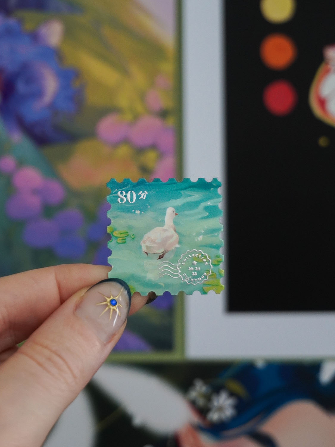 Mini Traveller: Foil stamp stickers by Vauliys Goose in the water sticker in the shape of a stamp with gold foil accents