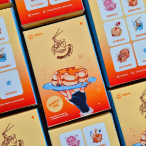 Yellow Acrylic pin, sticker & character Card blind/gacha box with the box design featuring a bunny-shaped pancakes served on a plate.