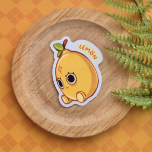 Vinyl sticker of a lemon sitting with dilated pupils with a 4 pointed star on it's forehead.