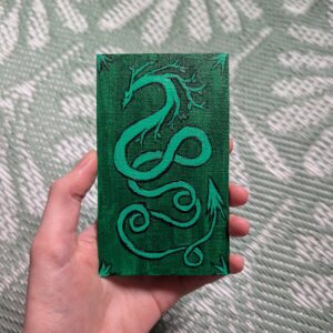 painting of a twisting green serpent