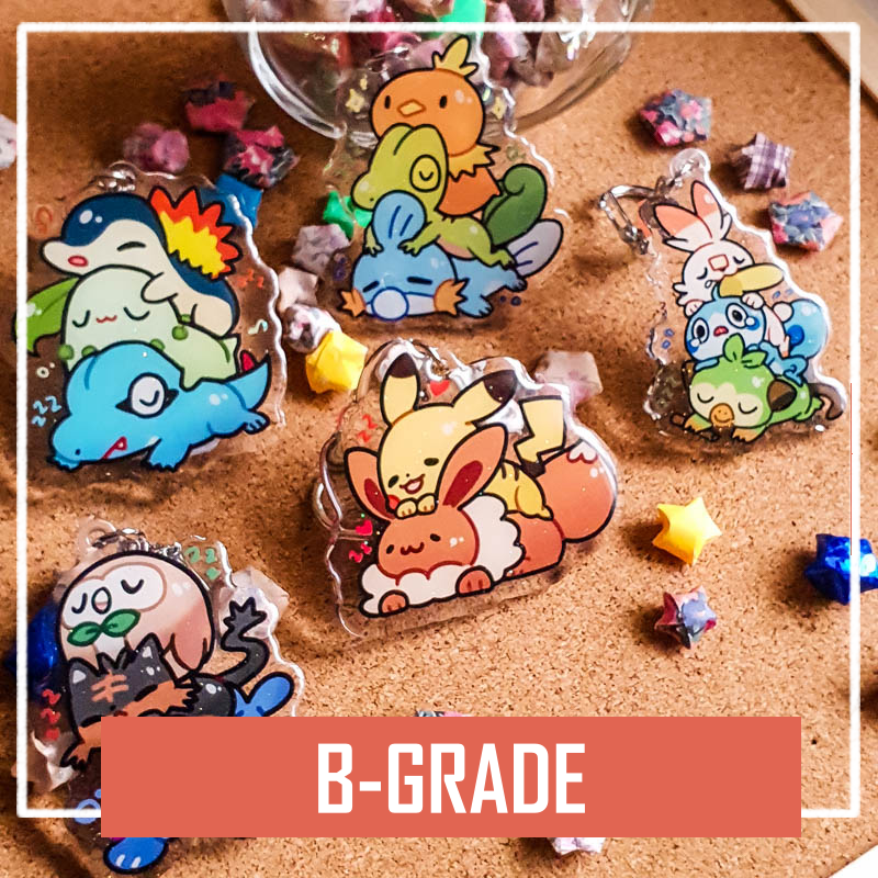 Pokemon Starters Acrylic Charms (B-Grade) by Nautilics Photo of a set of acrylic pokemon charms featuring different starter pokemon in stacks. A text label in the picture reads 'B-Grade'