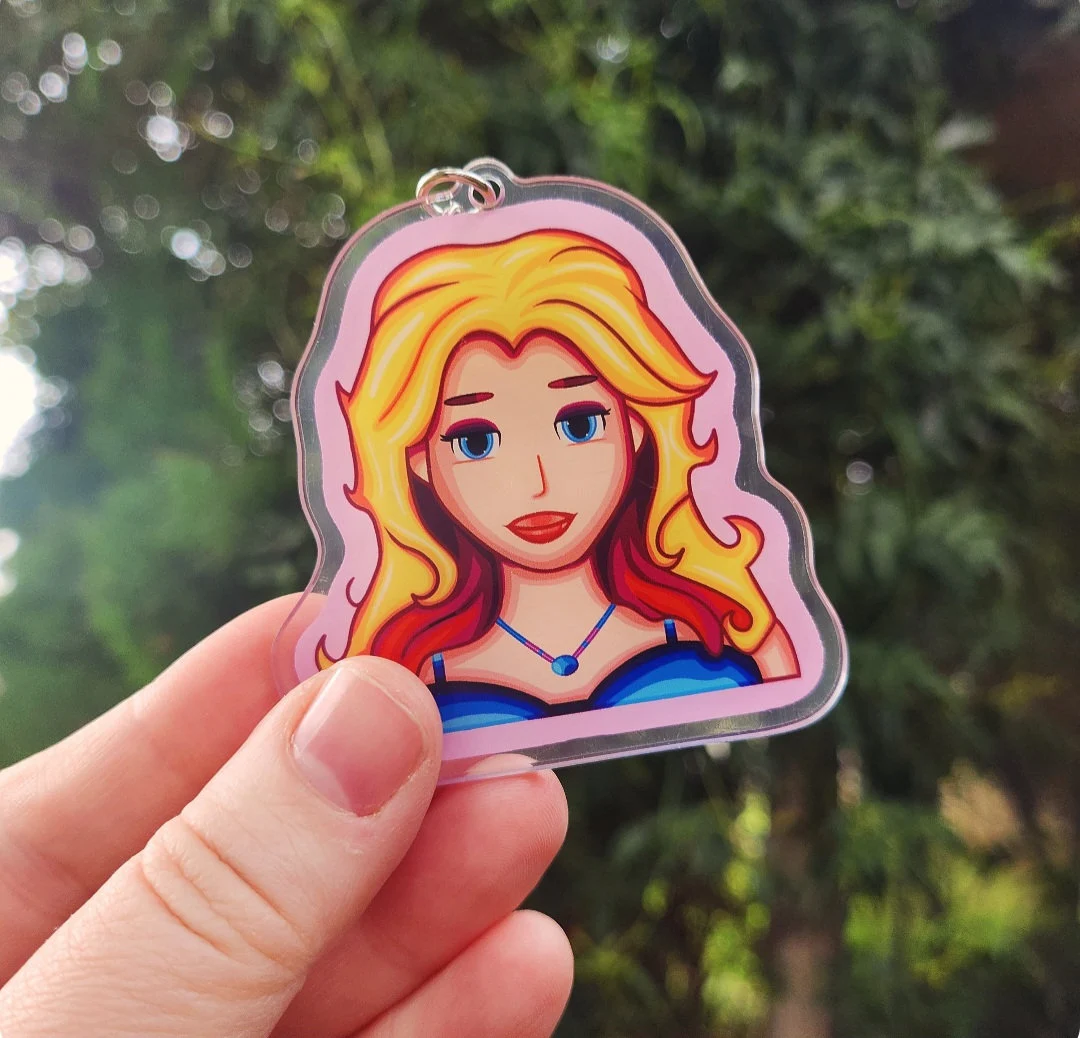 Stardew Valley Inspired Haley Gaming & Pop Culture Keyring Double-sided Stardew Valley Haley keyring (~7 cm) — lightweight, durable, and perfect for adding gaming charm to keys, bags, or backpacks.
