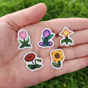 Bring a touch of Pelican Town to your everyday items with this cute flower sticker pack! Made from matte, waterproof vinyl, these stickers are durable, easy to apply, and perfect for decorating notebooks, laptops, water bottles, planners, and more.