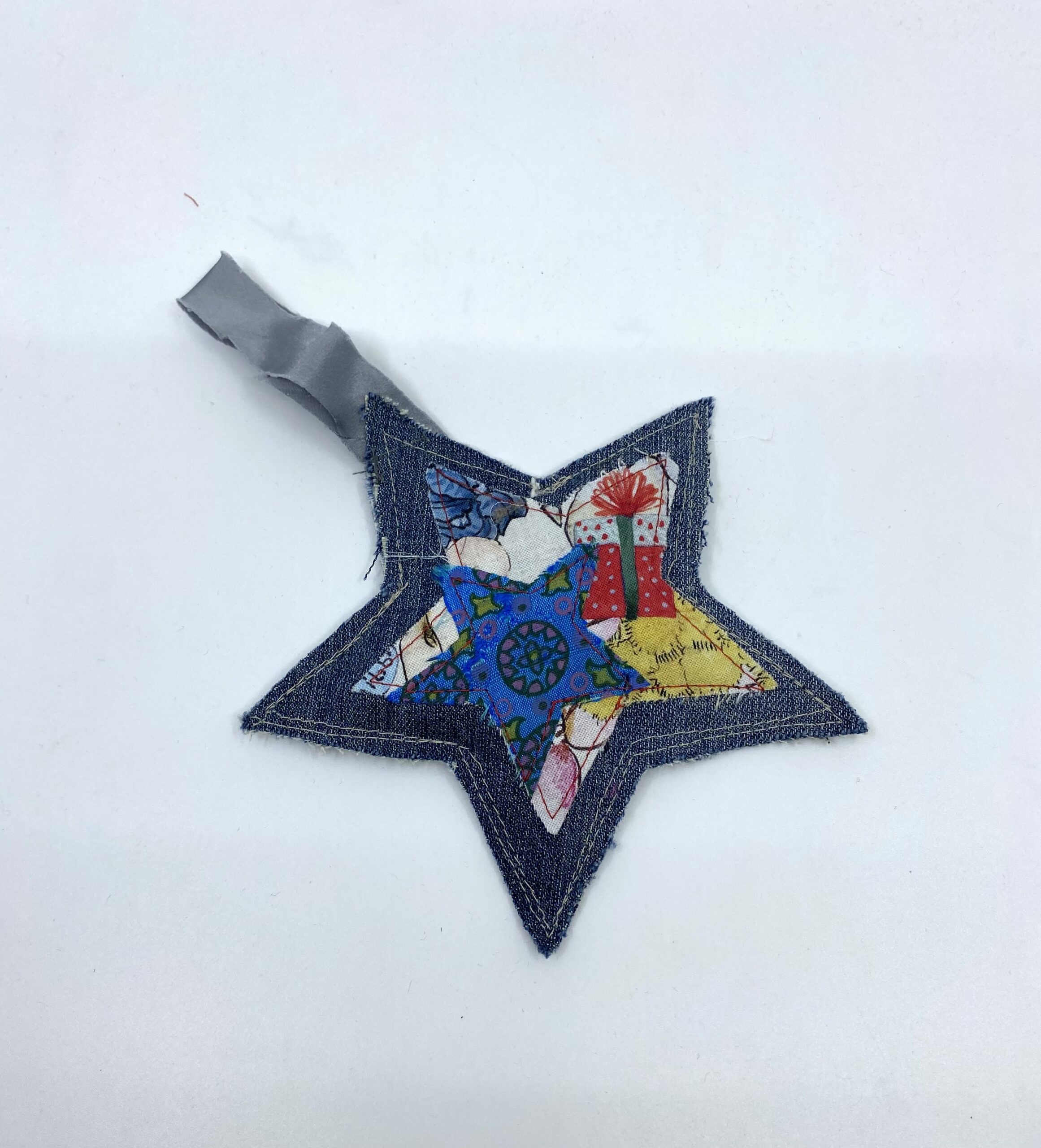 Blue silk and denim Christmas star by Judith Scott Upcycling Blue silk and denim Christmas star by Judith Scott Upcycling