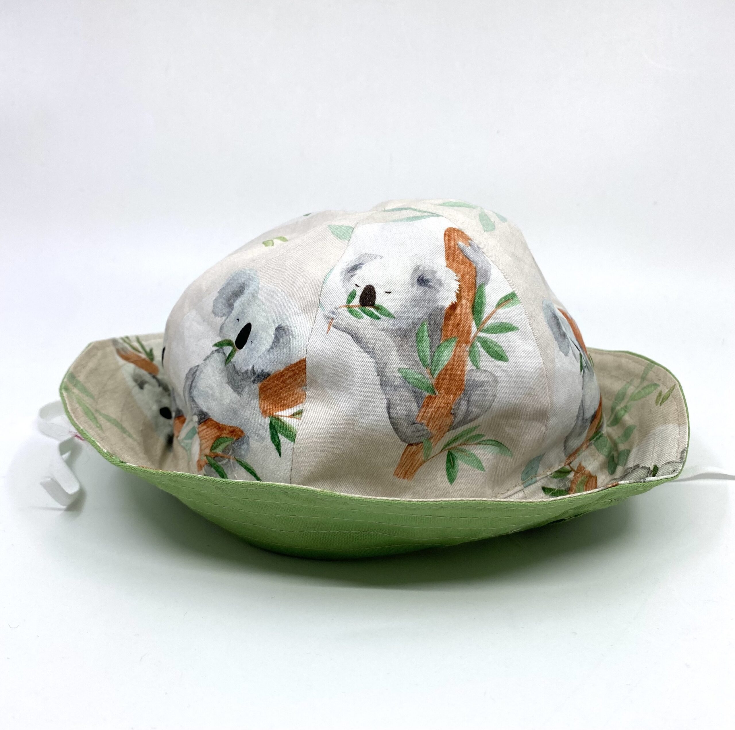 Koalas toddler hat (light green brim) by Judith Scott Upcycling Koalas toddler hat (light green brim) by Judith Scott Upcycling