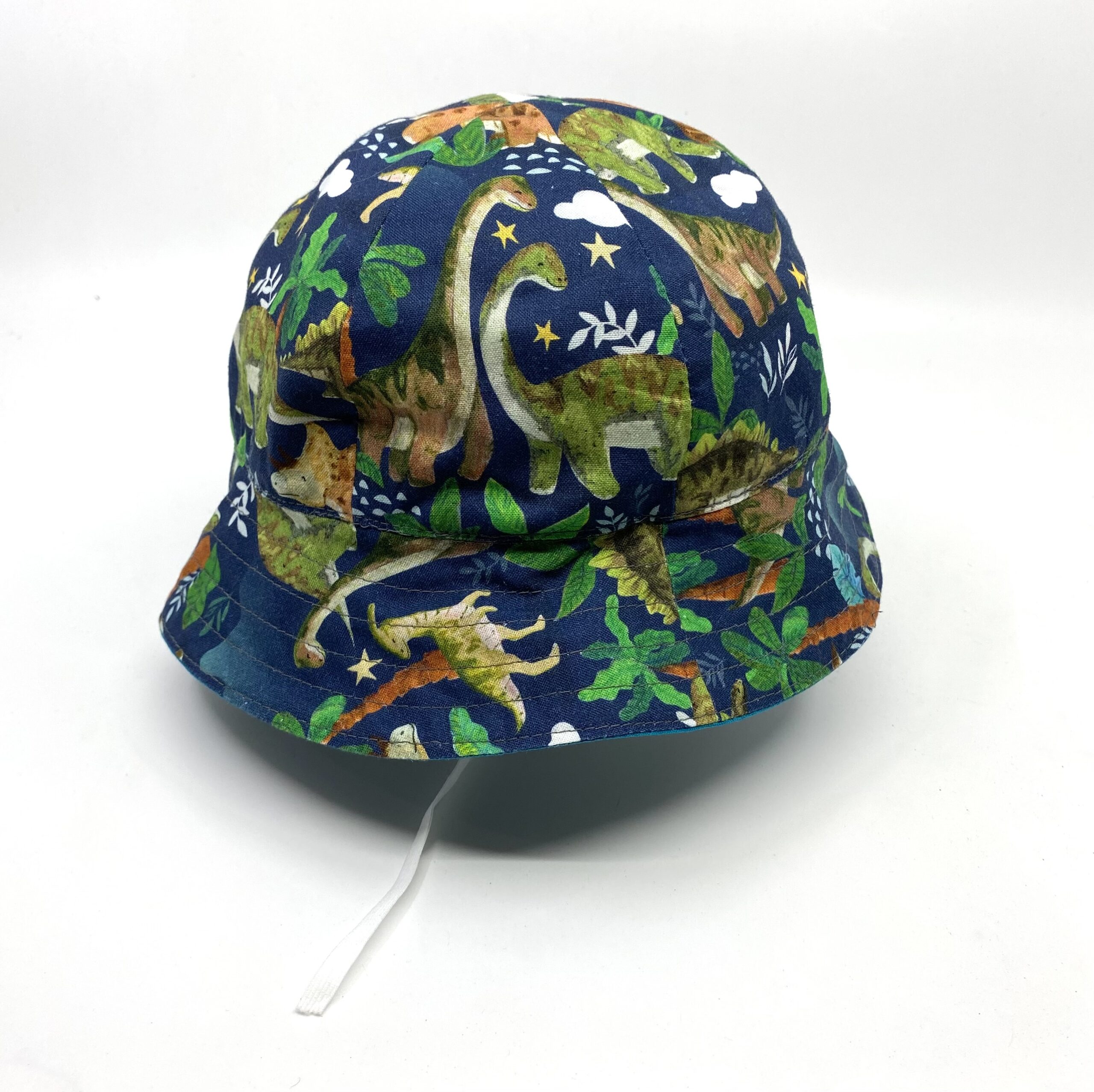 Dinosaurs toddler hat by Judith Scott Upcycling Dinosaurs toddler hat by Judith Scott Upcycling