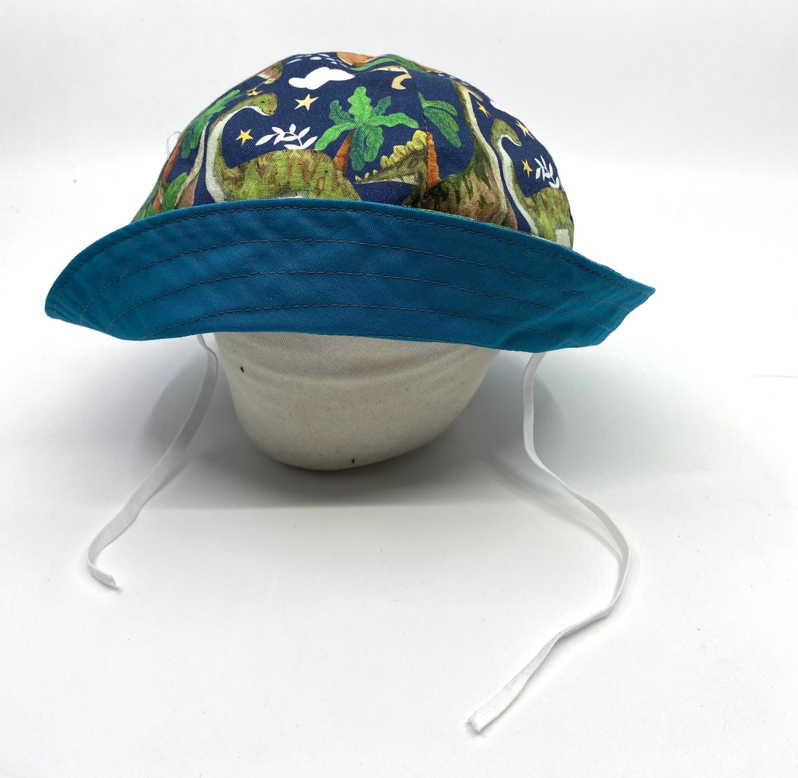 Dinosaurs toddler hat by Judith Scott Upcycling Dinosaurs toddler hat by Judith Scott Upcycling - Image 2