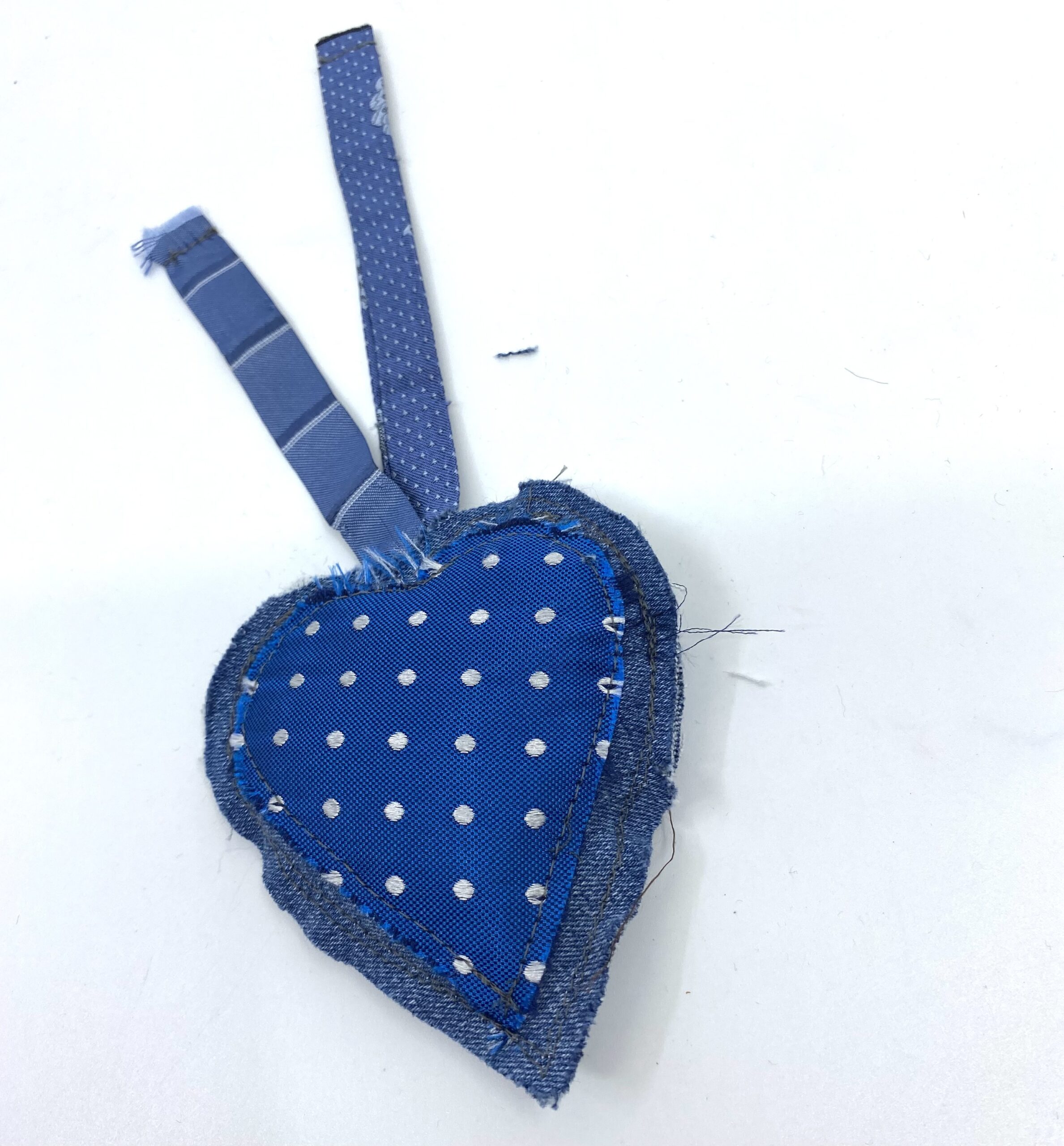 Denim and blue silk charm by Judith Scott Upcycling Denim and blue silk charm by Judith Scott Upcycling